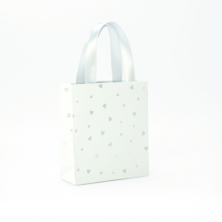 Prem. Blanc, sac pt 12x4,5x13,5cm Coeur.